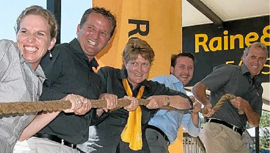 RAINE AND HORNE: Kristin Robinson, Michael Robinson, Sandy Roulston, Brendan Buckingham and Glen Millard are ready for the King of the Mountain Tug-of-War. RAINE AND HORNE: Kristin Robinson, Michael Robinson, Sandy Roulston, Brendan Buckingham and Glen Millard are ready for the King of the Mountain Tug-of-War.